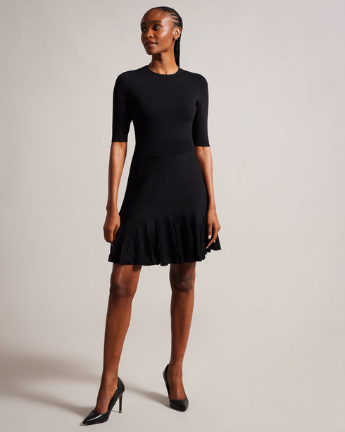 JOSAFEE-Dresses-When knitwear and glamour collide, you get JOSAFEE. This perfectly tailored mini dress boasts a figure hugging silhouette with a pleated hemline that ensures you'll look and feel fabulous in any setting, from a lunch date to a weekend exploring the city. Knitted mini dress Fit and flare silhouette Pleated hem Crew neck Half length sleeves Exposed zip fastening Ribbed waistband Jara is 5'10.5" / 1.79m and wears Dark Red in a Ted size 1 Feminine detailsA flirty pleated hem adds an interesting